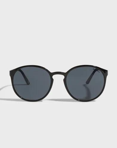 Le Specs Swizzle Runda solglasögon Svart 