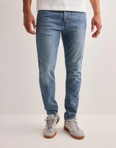 Levi's 515 Slim Taper Come on In Slim fit jeans Blå 