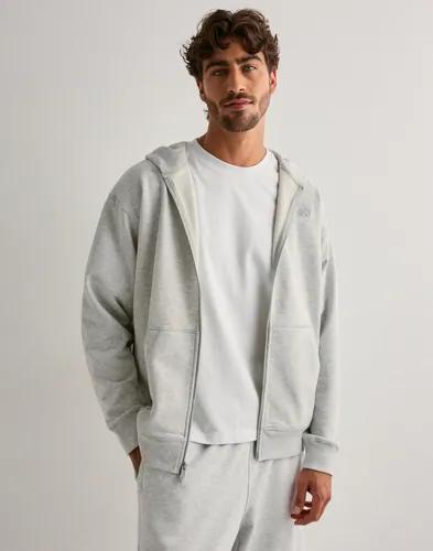 New Balance Athletics French Terry Full Zip Hoodies med dragkedja Grå 