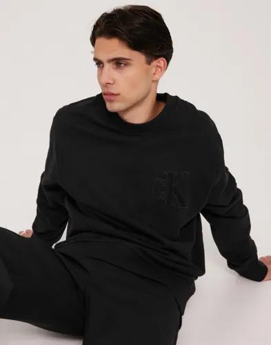 Calvin Klein Jeans Ck Applique Crew Neck Sweatshirts Svart 