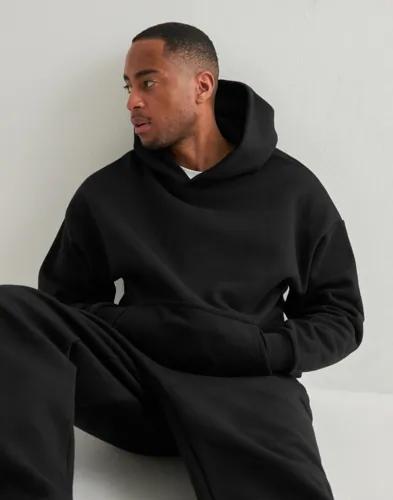 Que Sera Sera Cozy Hoodie Hoodies Svart 