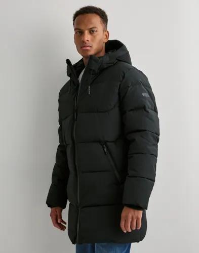 Woodbird WBJoseph Tech Long Jacket Puffer jackets Svart 