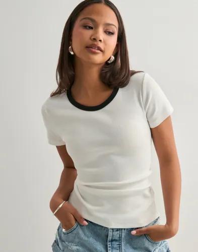 Se topplista för Skjortor