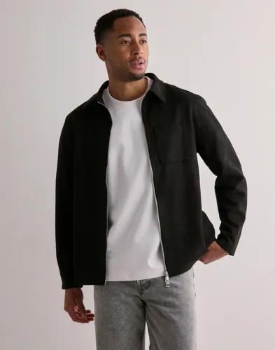 Se topplista för Skjortor