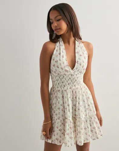 Se topplista för Klänningar