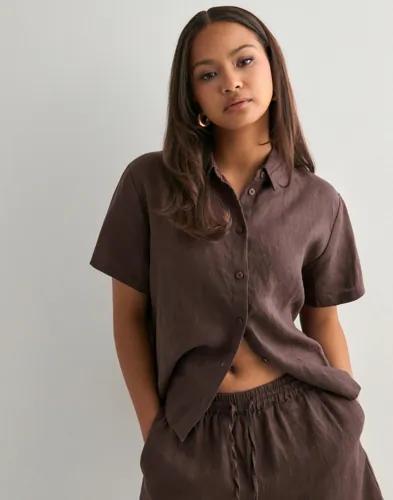 Se topplista för Skjortor