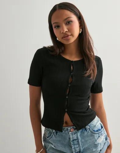 Se topplista för Skjortor