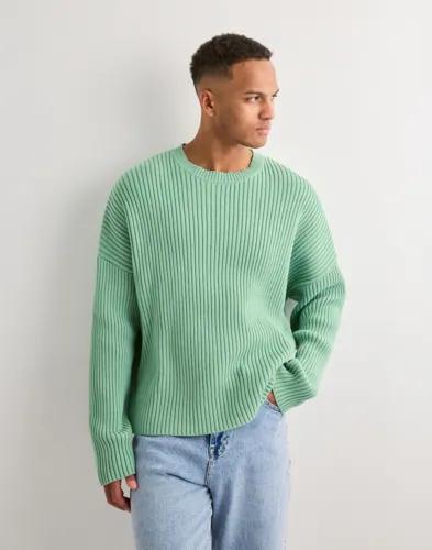 Que Sera Sera Roy Ribbed Knit Sweater Stickade tröjor Grön