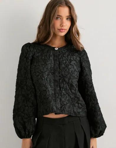 Se topplista för Skjortor