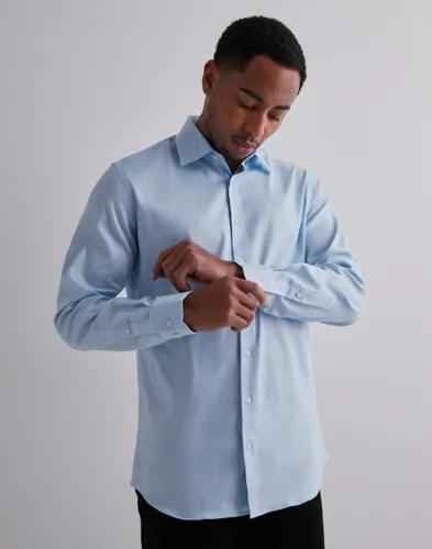 Selected Men Slhslim-Performance Shirt Ls Noos Enfärgade skjortor Blå 