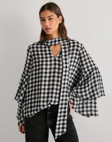 Se topplista för Skjortor