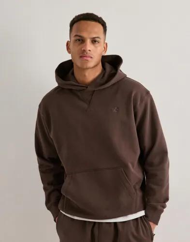 New Balance Athletics French Terry Hoodie Hoodies Brun
