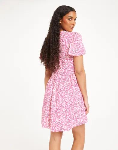 Se topplista för Klänningar