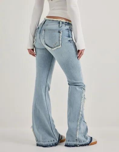 Se topplista för Jeans