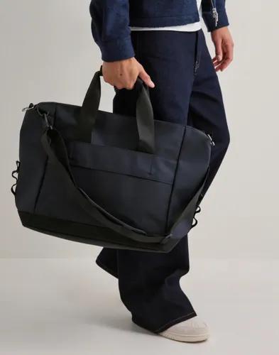 Rains Otaru Weekend Bag Small W3 Weekendbags Blå 