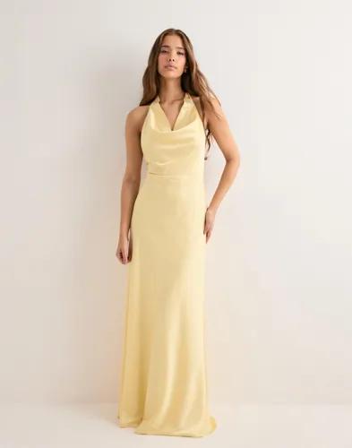 Se topplista för Klänningar