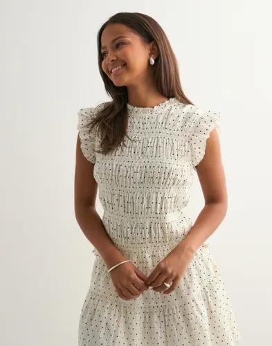 Neo Noir - Vit - Tarsi Dot Top 