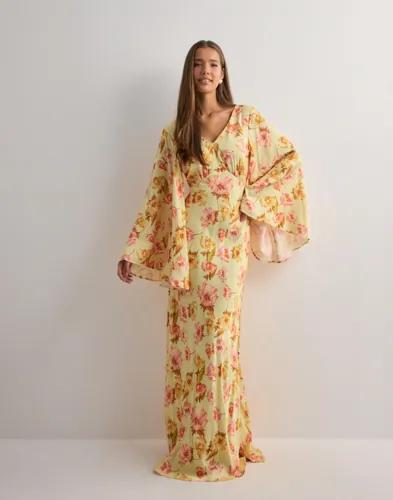 Se topplista för Klänningar