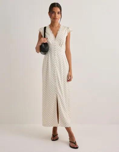 Se topplista för Klänningar