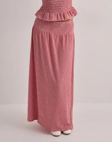 Se topplista för Kjolar