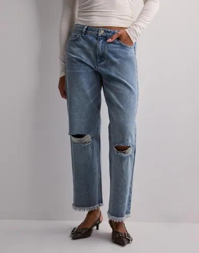 Se topplista för Jeans