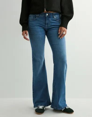 Se topplista för Jeans