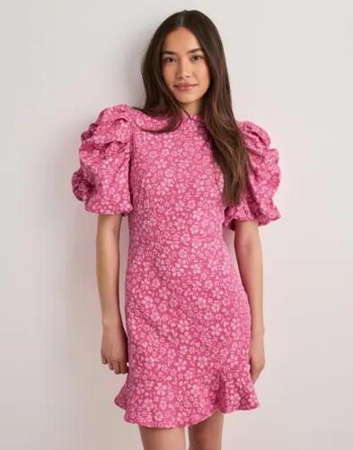 Se topplista för Klänningar