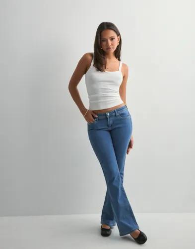 Se topplista för Jeans