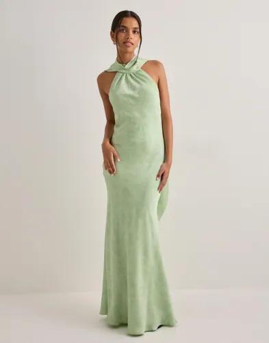 Se topplista för Klänningar