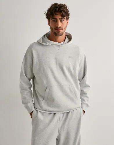 New Balance Athletics French Terry Hoodie Hoodies Vit 