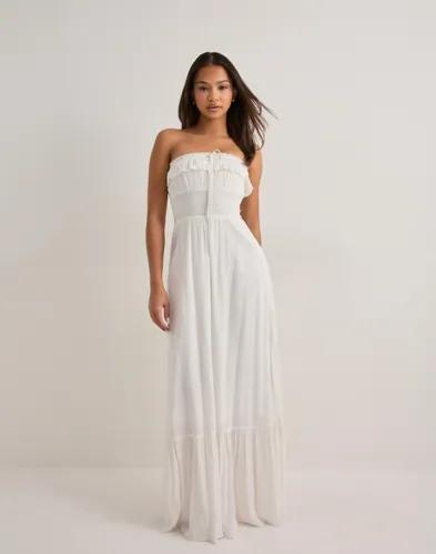 Se topplista för Klänningar