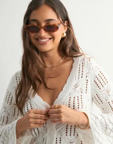 Se topplista för Accessoarer