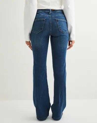 Se topplista för Jeans