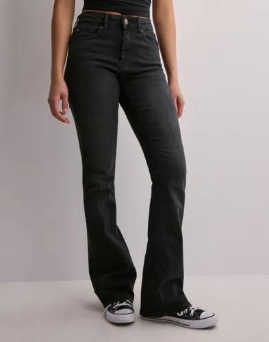 Se topplista för Jeans