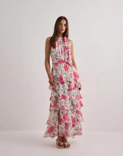 Se topplista för Klänningar