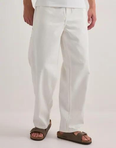 Se topplista för Jeans