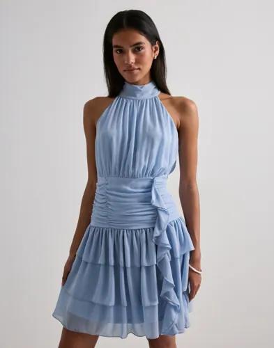 Se topplista för Klänningar