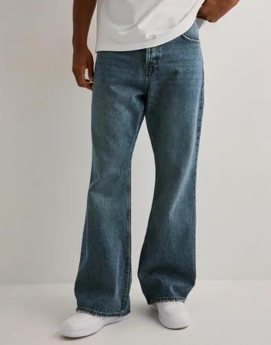 Se topplista för Jeans