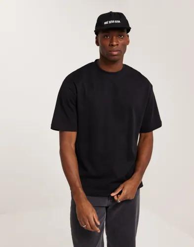 Selected Men Slhlooseoscar Ss O-Neck Tee Noos Oversized t-shirts Svart 