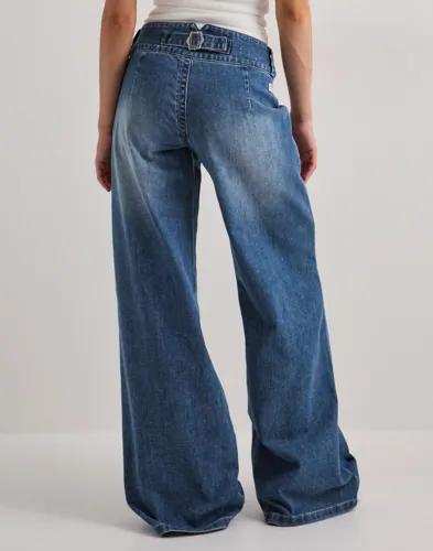 Se topplista för Jeans
