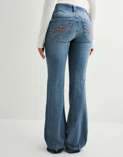 Se topplista för Jeans
